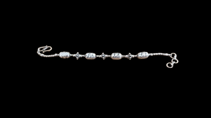 Silver Statement Bracelet with 4 hammered metal beads